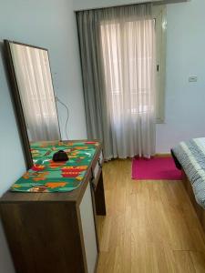 Postel nebo postele na pokoji v ubytování sheraton apartment