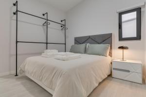 Postel nebo postele na pokoji v ubytování Graça House