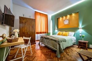 Postel nebo postele na pokoji v ubytování Sabry Home Florence Guest House Affittacamere