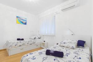 Кровать или кровати в номере Apartment Royal