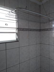 Ένα μπάνιο στο Apartamento de férias na Praia da Pitória