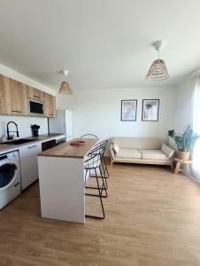 Küche/Küchenzeile in der Unterkunft Moderne et charmant T2