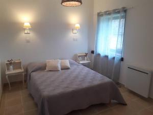 Katil atau katil-katil dalam bilik di Gîte du Petit Bois 2/5 pers