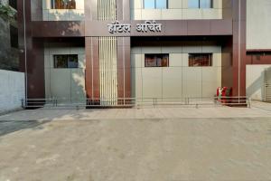 an empty parking lot in front of a building at Hotel Archith in Navi Mumbai