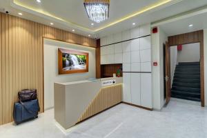 TV a/nebo společenská místnost v ubytování Hotel Archith