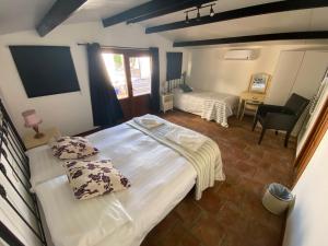 Posteľ alebo postele v izbe v ubytovaní Casa La Negra + 37 fotografií