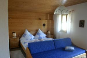 Ένα ή περισσότερα κρεβάτια σε δωμάτιο στο Haus Annelies