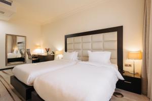 Katil atau katil-katil dalam bilik di Paris Hotel Yerevan