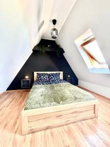 En eller flere senge i et værelse på My Old Town Gdańsk - Apartament dwupoziomowy Długa 56