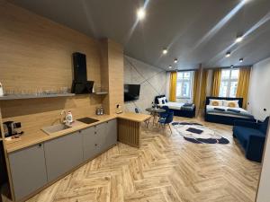 LOFT HOUSE APARTMENTS的电视和/或娱乐中心