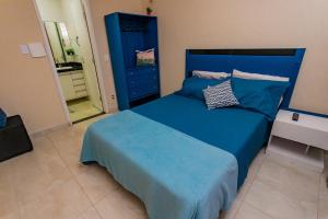 เตียงในห้องที่ Otimo flat a 750m do mar Sta Monica Guarapari ES