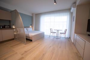 Ein Bett oder Betten in einem Zimmer der Unterkunft Be Mate Torino Centro