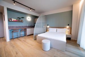 Ein Bett oder Betten in einem Zimmer der Unterkunft Be Mate Torino Centro