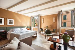 Postel nebo postele na pokoji v ubytování Liassidi Wellness Suites + 37 fotografií