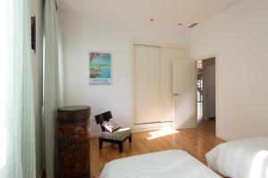 En eller flere senge i et værelse på Veoapartment Cervantes Terraza