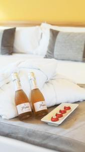 Posteľ alebo postele v izbe v ubytovaní Hotel Real