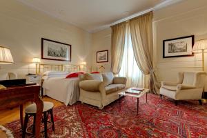 Postel nebo postele na pokoji v ubytování Grand Hotel Plaza + 37 fotografií