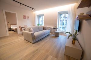 Ein Sitzbereich in der Unterkunft Be Mate Torino Centro