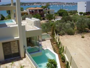 an aerial view of a house with a swimming pool at RVG Rania House with pool in Porto Heli