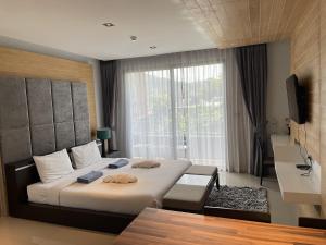 Et tv og/eller underholdning på Emerald Terrace Apartments by Lofty