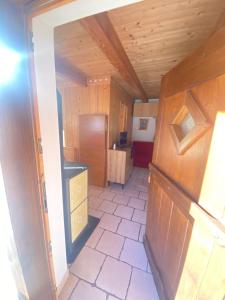 A kitchen or kitchenette at Appartamento al Tabià Pizal