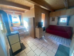 A kitchen or kitchenette at Appartamento al Tabià Pizal