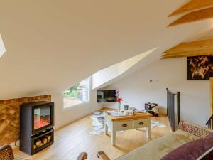 a living room with a couch and a fireplace at 2 Bed in Beverley 88422 in Lund