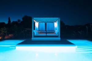 The swimming pool at or near Ibiza Holliday Villa Harmony