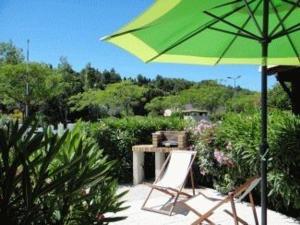 Zahrada ubytování Villa T2 Mezzanine 4 pers avec Parking à La Franqui - FR-1-81-370