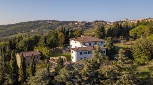 an aerial view of a house on a hill at Villa Godenano - Country Chianti Villa in Castellina in Chianti