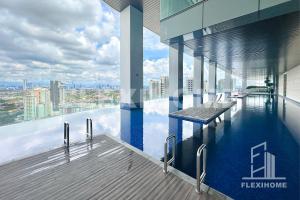 a view from the top of a building with a pool at 1-5 Guests, 2BR Family Home, Azure Residences PJ-Beside Paradigm Mall - Flexihome MY in Petaling Jaya