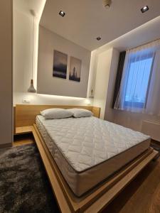 Postel nebo postele na pokoji v ubytování Zlatni Javor, Apartment 408 + 28 fotografií