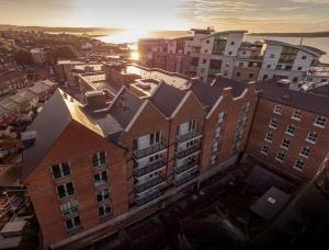 an overhead view of a city with tall buildings at Coastal Cove in Poole