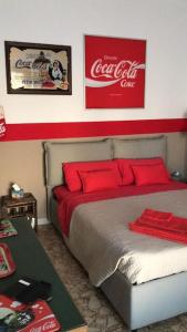 Postel nebo postele na pokoji v ubytování Coca Cola Studio