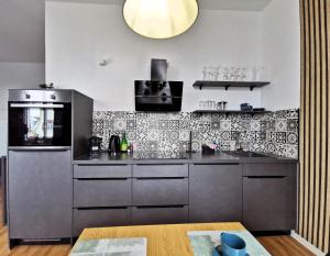 Η κουζίνα ή μικρή κουζίνα στο BohnApartments - Münze im Brühl - Alte Oper - Theater - WLAN +10 φωτογραφίες