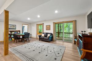 a living room with a ping pong table at Antlers Crossing in McGaheysville