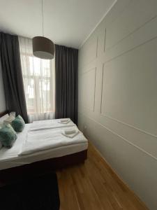 Postel nebo postele na pokoji v ubytování ON/SET APARTHOTEL