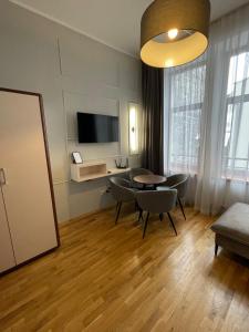 TV a/nebo společenská místnost v ubytování ON/SET APARTHOTEL