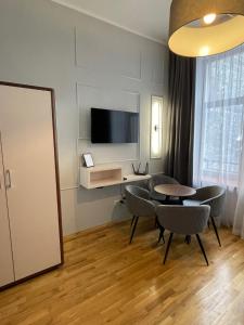 TV a/nebo společenská místnost v ubytování ON/SET APARTHOTEL