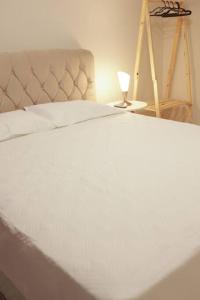 Легло или легла в стая в Apartamento na região céntrica