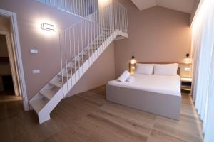 Ein Bett oder Betten in einem Zimmer der Unterkunft Be Mate Torino Centro