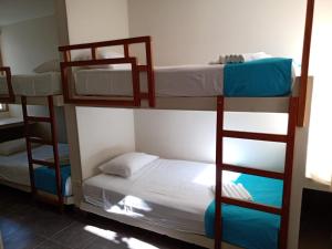 מיטה או מיטות קומותיים בחדר ב-Casasol_mancora