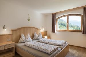 Posteľ alebo postele v izbe v ubytovaní Residence Reisenschuh