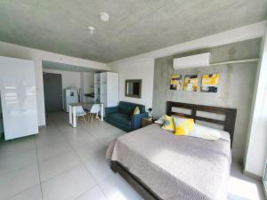 Cama o camas de una habitación en 0509 iFreses Hermoso Apartamento con Aire Acondicionado y Parqueo