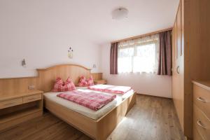 Posteľ alebo postele v izbe v ubytovaní Residence Reisenschuh