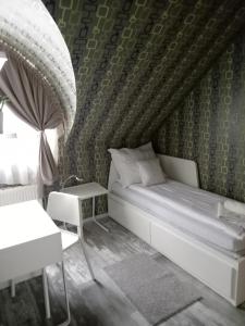 Posteľ alebo postele v izbe v ubytovaní Ede Apartman
