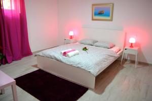 Postel nebo postele na pokoji v ubytování Apartment Paulina