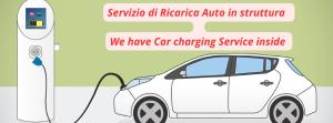 a car is plugged into a car charger at Belvedere Rent Rooms in Campofelice di Roccella