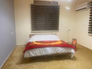 Een bed of bedden in een kamer bij Darkum Apartment