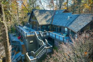 an aerial view of a house with a roof at Stunning Cashiers Vacation Home with Mountain Views! in Cashiers